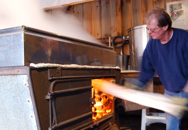 Doug Bragg works in his sugarhouse in East Montpelier.