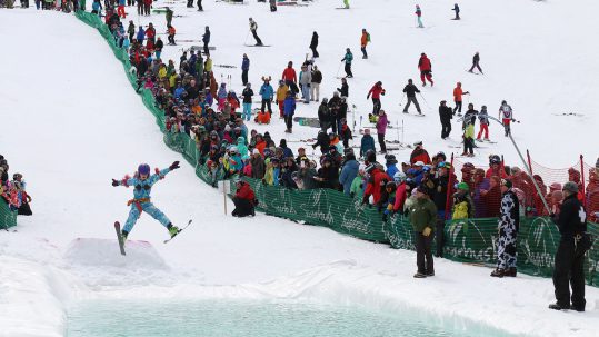 The Spring Tradition of Pond Skimming at Ski Areas